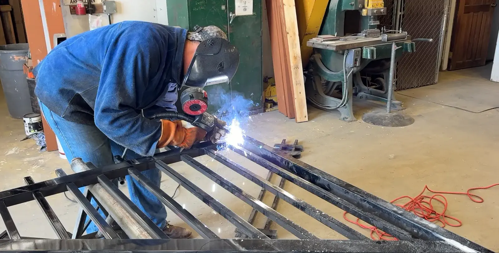 Welding repair on a steel gate frame in Edmonton